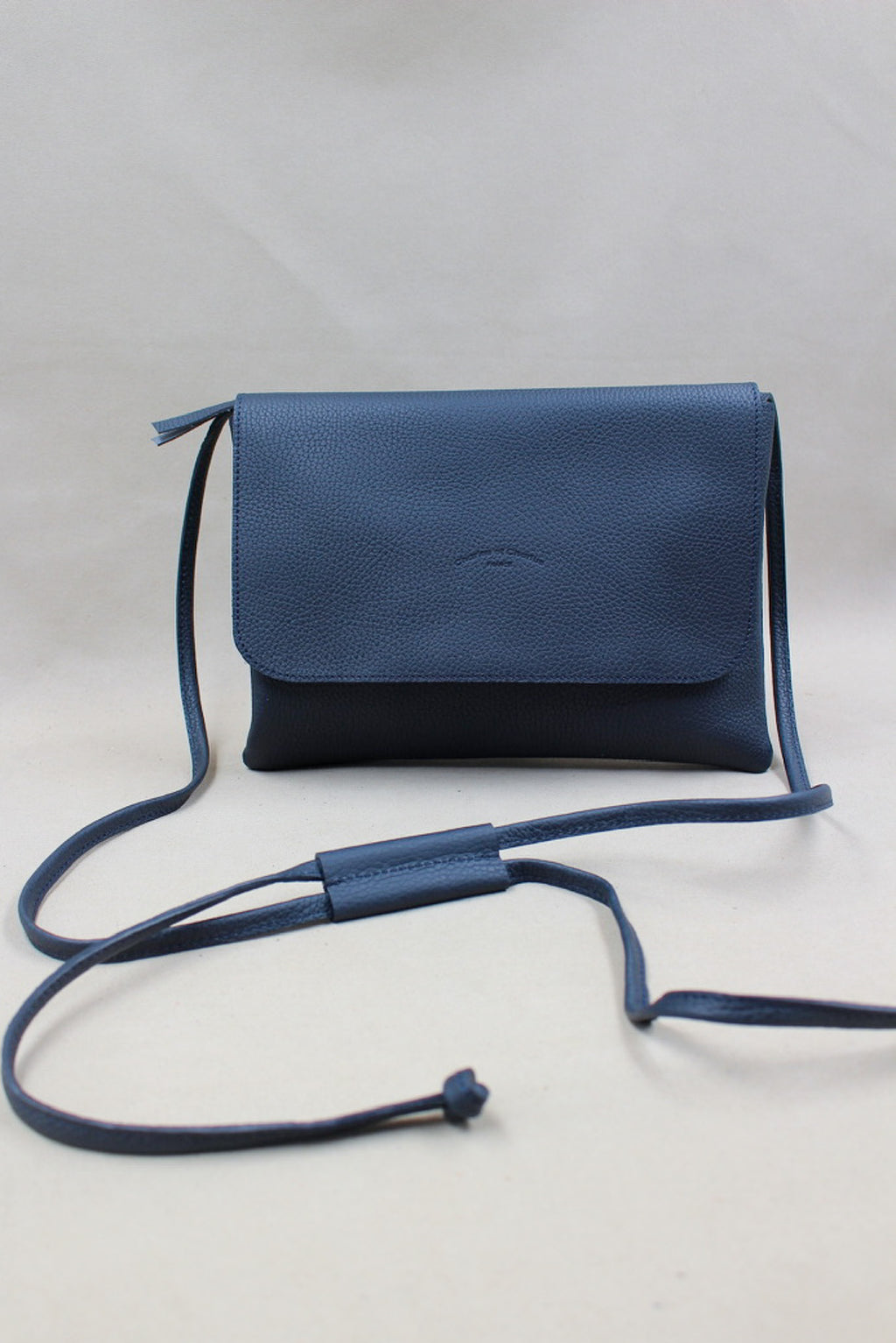 Pochette bandoulière réglable en cuir